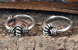 Silberne Unisex-Ohrringe mit balinesischem Design