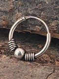 Silberne Unisex-Ohrringe mit balinesischem Design